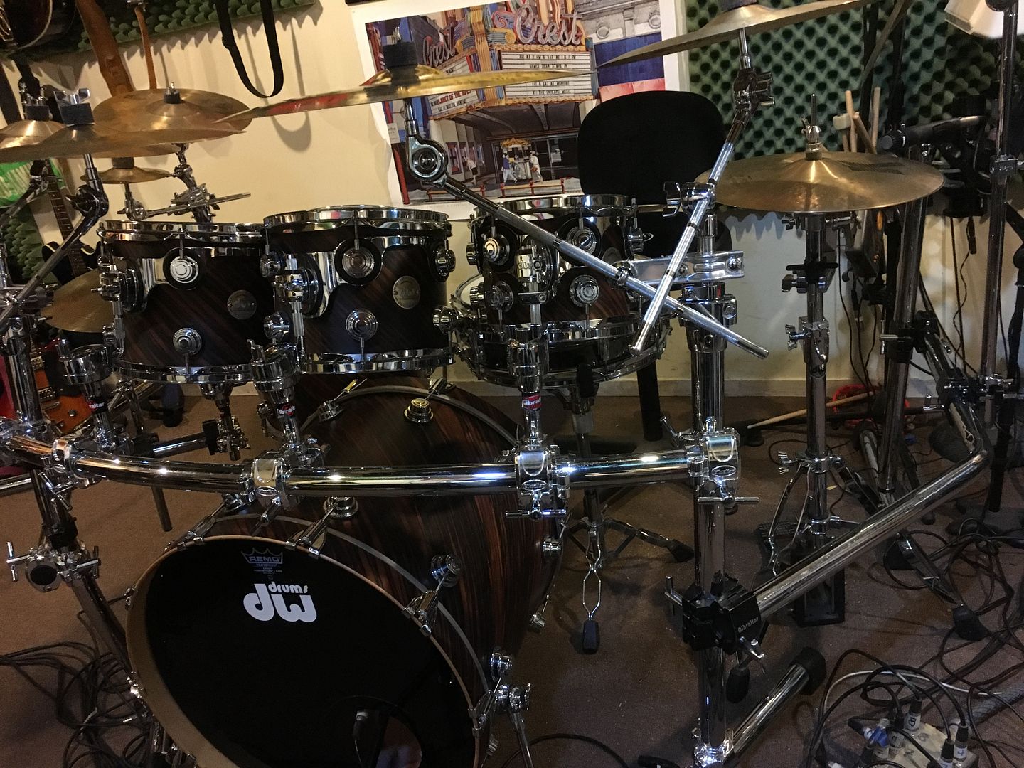 Cymbal stands connected to mounted tom stands?
